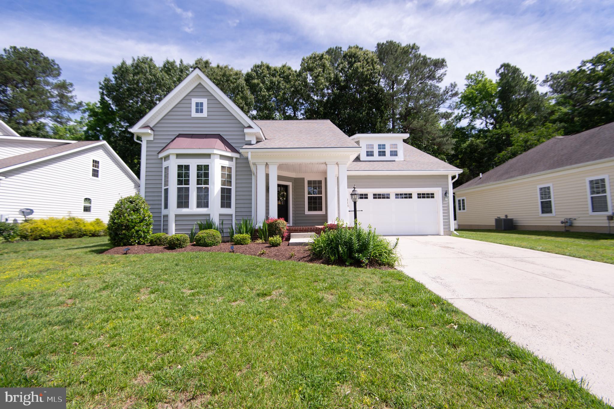 Beautifully maintained and move-in ready 4BR/3BA Craftsman style home in the desirable community of Longboat Estates! Drive down the tree-lined street and pull into the double wide driveway, complete with a two car garage. Make your way past a lush green lawn and well kept landscaping to the welcoming covered front porch. Open the door to your new 3,401 square foot home and step into a spacious entry foyer. To the right is a home office with built-in cabinets and to the left, a sitting room with the open concept view into the formal dining room featuring a tray ceiling and chair railings. Continue on through into the heart of the home, the kitchen and family room. The large family room features a gas fireplace with a mantel and a built-in cabinet. The kitchen boasts abundant cabinetry with crown moldings, a separate pantry closet, stainless steel appliances featuring a gas cooktop and a double wall oven, beautiful granite countertops, a movable butcher block island, a raised breakfast bar at the peninsula with seating and additional space for a breakfast table. The main level also offers a spacious primary suite with a large walk-in closet and two additional closets, plus a private en suite featuring a double sink vanity, deep soaking tub, and walk-in tile shower. A second bedroom, full bath, and laundry room with garage access complete the first floor. Upstairs, you’ll find two generously sized bedrooms with walk-in closets, a shared full bath, and a versatile bonus space, perfect for a second office, reading nook, or extra storage. From the family room, step out to the screened-in porch with ceiling fans and recessed lighting, overlooking a recently fenced backyard with shade trees and plenty of room for entertaining. This home has so much to offer any new homeowner including hardwood floors on the main level, new carpet in the primary suite, a freshly painted interior, gutter guards, a lawn irrigation system, recently updated HVAC and a tankless water heater. This community offers tons of amenities including a boat ramp, docks, and a community pool, and just minutes from shopping, restaurants, and commuter routes.