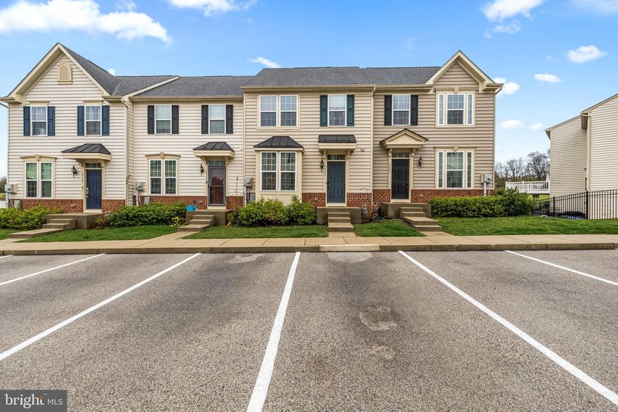 Welcome home to 7923 Erinvale Ln. which offers over 2,000sf of living space in Logans Reserve- only minutes off of I83. This home boasts a gorgeous upgraded kitchen with semi custom cabinetry, granite countertops, and stainless appliances. Off the kitchen, you can enjoy a large brand new maintenance free deck. In your owners suite, you'll be greeted by a tray ceiling, large WI closet, and a beautiful owners bath with dual granite vanity, walk in shower, and glass enclosure. Lower level is fully finished with a bonus room/office area and a Half bath. Half bath has a shower rough in if you so wish! Tankless water heater for optimal efficiency. Community has walking trails and a community center with a pool. Schedule your private showing today!