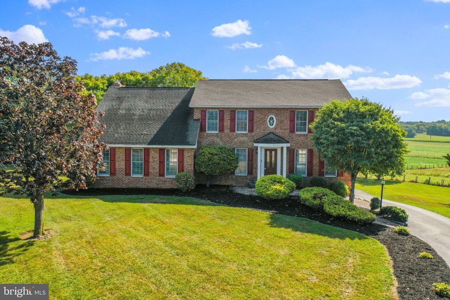 Beautiful all-brick colonial in the Potomac Estates! Situated on just under an acre of land at the end of a cul-de-sac and featuring 5 bedrooms, 4.5 baths. Boasting over 4,000 sq.ft. of living space. Main level offers a sitting room, formal dining room, eat-in kitchen with cherry cabinets, ample cabinetry & table space, pantry, breakfast bar, laundry room, and large family room with wood-burning fireplace. Office room. Bedrooms on upper level. Primary bedroom with walk-in closet and two additional closets, en suite with jetted tub, separate shower, double sinks, and new tile floors. Finished basement with family room, full bath, and unfinished storage area. Walkout to the backyard patio. Large deck with a scenic pastoral view. Williamsport school district. Close to