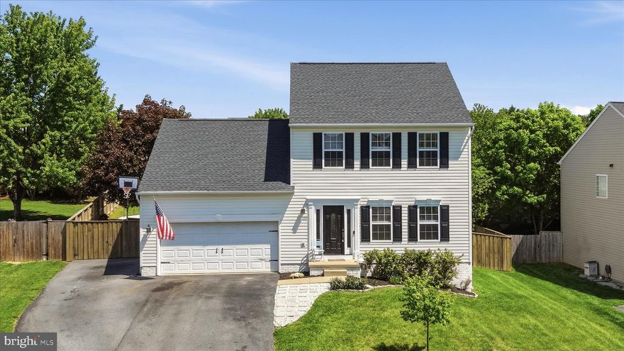 Beautifully maintained and ideally located in sought-after Charles Town, 120 Posting Way offers a comfortable setting with many attractive updates just minutes from shopping, dining, and commuter routes. Nestled on a landscaped lot with mature trees, this property features exceptional curb appeal and a fully fenced backyard with a deck and custom fire pit area designed for both privacy and enjoyment. Inside, you’ll love the bright open floor plan with generous living spaces perfect for everyday living and entertaining. The spacious main level is anchored by a cozy gas fireplace, while the kitchen offers a built-in pantry, abundant storage, granite counters, a custom range hood, and seamless flow into the dining and gathering areas. With nearly 3,000 square feet of finished living space, this 3 bedroom, 3 bath home also includes a newly finished basement complete with a full bath—ideal for guests, recreation, or a home office. Need extra parking? You’ll appreciate the additional parking pad conveniently located behind the fence. Major updates provide peace of mind, including a 2018 roof and a new water heater. Thoughtful upgrades throughout make this home truly move-in ready and a great value for this popular neighborhood. If you’re looking for space, outdoor living, and a prime Charles Town location, this lovely residence is a must-see!