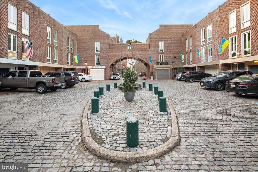 Welcome to 503 Addison Court.  Rarely Offered! This light-filled, Southern exposed home located in the heart of Society Hill in a quiet, private cobblestone courtyard community with 2 car parking is the ideal place to call home.  This home has just been updated throughout.   Enter through the front door into a full natural light foyer with Carrara marble tile and access to the first floor or lower level. Lower-level features Carrara marble tile flooring, storage closet, powder room, office space or sitting area, and laundry/utility room.  Main level just up the stairs is where you will enjoy a stunning living room filled with natural light from floor to ceiling windows and transoms, 12' ceilings, Carrara marble gas fireplace for those chilly nights and access to a private rear garden with deck for entertaining friends and family. Just up another few stairs will bring you into a nice sized bright dining room with custom built in cabinetry for more kitchen or dining room storage, and a built-in wine cooler with quartz countertop. Kitchen: perfect for preparing those gourmet meals features custom wood cabinets, stainless steel appliances with a slide in stove, Quartz countertops, marble tile backsplash, and under cabinet lighting. 2nd floor: Two nice sized bedrooms with two double closets each, full tile bath with space saving pocket door. 3rd floor: A third bedroom with closet space, full tile bath with stall shower, laundry hook up for added convenience as a 2nd laundry, and access to a roomy balcony overlooking the courtyard for tanning or to just read a book in the warm sunshine. Additional features: new garage door, lift motor and remotes, Hardwired smoke and CO detectors throughout, recessed lighting, refinished hardwood flooring, and solid wood doors throughout with upgraded hardware.