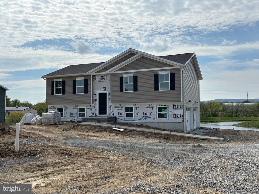 New construction bilevel
This beautiful home features three bedrooms including primary suite with primary bathroom, 2nd full bathroom, open concept living/dining/kitchen, rear deck with beautiful views. Lower-level features spacious family room, laundry room and half bath. Two car attached garage.