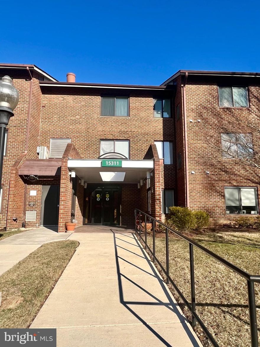 Welcome to Leisure World an Age 55+ Community.  This well cared for 3 bedroom with 2 full bath condo is full of light and has Vaulted ceilings.  The balcony has an updated enclosure where you can enjoy the view!  The includes hardwood floors, fresh paint, and new carpet in the 3 bedrooms.  Enjoy your separate laundry room with full sized washer and dryer.   There is also additional storage in the building.  All utilities are included in the condo fee, including basic cable and internet.  I Assigned parking space is included.