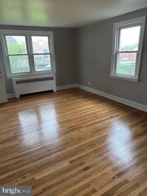 Recently renovated 1st floor unit; modern kitchen with shaker style cabinets, freshly refinished hardwood floors, freshly painted, washer and dryer in basement, shared 2 car garage with upstairs tenant. First month's rent, last month's rent and security deposit due at signing of lease. 2 Bedroom Section 8 Voucher is possible or good credit and employment history.