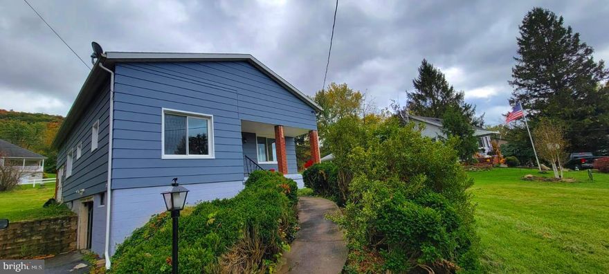 This lovely house has been renovated from top to bottom!!   A new roof, all new windows from Window World, newly finished hardwood floors, an all new kitchen, a new bathroom, a new oil fired furnace.  As welll as Freshly painted on the outside, as well as a termite treatment w 10 year warranty.  Come see this house and you will fall in love!!  The basement has lots of room for storage and a garage entrance. The driveway is long enough for 15 cars!!  There is a side entrance into a sun room w ceramic floors and freshly painted as well.  You have to see to believe.