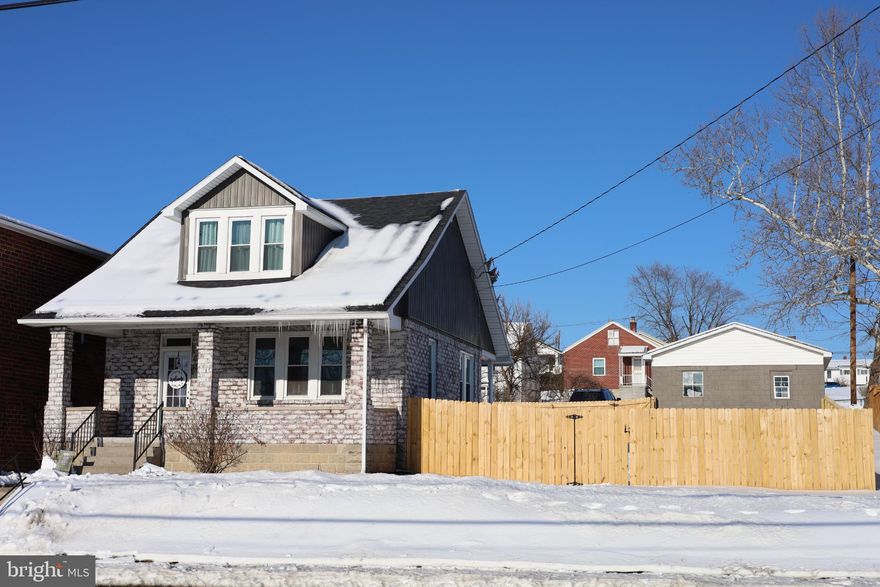 Welcome to 1102 E Oldtown Rd!! This updated home boasts many updates that were made in 2023. The roof, electrical updates, laminate flooring, full bathroom with a tiled walk-in shower and bathtub complete with tile floor are just a few of the updates that you will find in this home!! Replacement windows and recessed lighting can be found throughout the house, as well. Dream of warm summer nights on the front or back porches!! Just minutes from downtown, but the newly installed fence for the backyard provides the privacy and seclusion for kids, pets, or that cookout with family and friends!! Fence was installed by Upright Fence last summer. No on street parking here!!! The alley behind the house leads you to the driveway or garage to protect your vehicle from winter's harshest elements. This garage could also be used as a workspace or for storage. You will be impressed with this one!! Schedule your appointment today and turn this home into yours!!