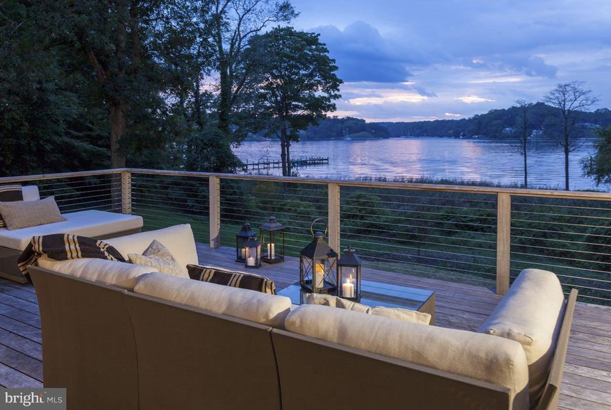 Serious reduction for an amazing property  and a  one of  kind value in the current market .Outstanding Severn River Waterfront on 4 private acres just minutes from Downtown Annapolis. Sweeping views of the Severn River from this wonderfully renovated 5 bedroom, 4.5 bath home. The Light filled open floor plan offers first floor living and boundless entertaining spaces. 325' of water front footage, private pier, 2 power boat lifts & 20' x 40' pool permit in hand. 3 car Garage..Mins to Bay