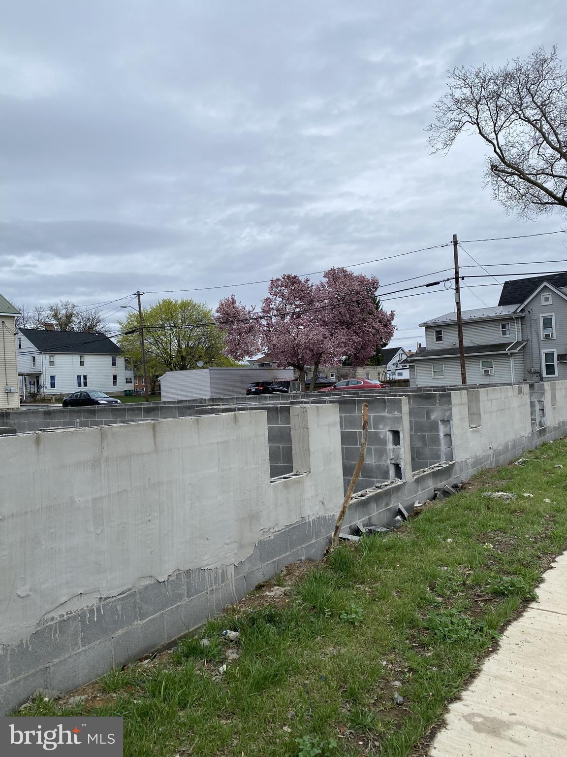 ***OWNER WILL CONSIDER OWNER FINANCING*** Approved Triplex Building Lot in the boro of Chambersburg near interstate, downtown and shopping. 32x91 double lot. Off street parking. Lot has foundation and sidewalks installed on site. Seller has obtained the approvals; making this a great opportunity for a builder to complete the construction/building of 3 colonial style triplex. Seller has building permits, paid water/sewer hookup fees and approved floor plans for 3 units. Two parcels: 04-1E25-005 and 04-1E25-006. Call listing agent for more details.