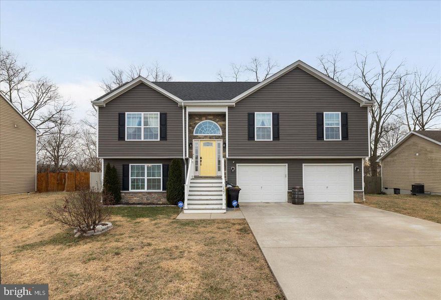 Nestled in the serene community of Crestfield, this exquisite split foyer home, built in 2017, offers a harmonious blend of modern elegance and cozy comfort. Spanning an impressive 3,008 square feet, this residence is designed for those who appreciate high-end living and the tranquility of nature. As you step inside, you are greeted by an open floor plan that seamlessly connects the living, dining, and kitchen areas, creating an inviting space perfect for both entertaining and everyday living. The gourmet kitchen is a chef's dream, featuring upgraded countertops, a spacious island, and top-of-the-line appliances, including a dishwasher, microwave, refrigerator, and stove. The combination kitchen and dining area is bathed in natural light, enhanced by recessed lighting and ceiling fans that add to the ambiance. The living room is anchored by a stunning gas fireplace with elegant mantels, providing a warm focal point for gatherings. The thoughtful layout includes luxurious touches such as walk-in closets and a primary bath that exudes spa-like tranquility. Venture downstairs to discover a fully finished daylight basement that offers versatile space for recreation or relaxation. With garage access and a walkout level, this area is perfect for hosting guests or enjoying quiet evenings at home. Step outside to your private outdoor oasis, where a spacious deck and patio beckon for al fresco dining and entertaining. The lot, spanning 0.17 acres, backs to lush trees, providing a serene backdrop and a sense of seclusion. Parking is a breeze with an oversized attached garage and a concrete driveway, ensuring ample space for vehicles and storage. This home is not just a residence; it's a lifestyle. Enjoy the benefits of a well-maintained community with amenities that include common area maintenance, road maintenance, and snow removal, allowing you to focus on what truly matters. Experience the perfect blend of luxury and comfort in this remarkable property, where every detail has been thoughtfully curated to create a warm and inviting atmosphere. Embrace the exclusive lifestyle that awaits you in Crestfield, where your dream home becomes a reality.