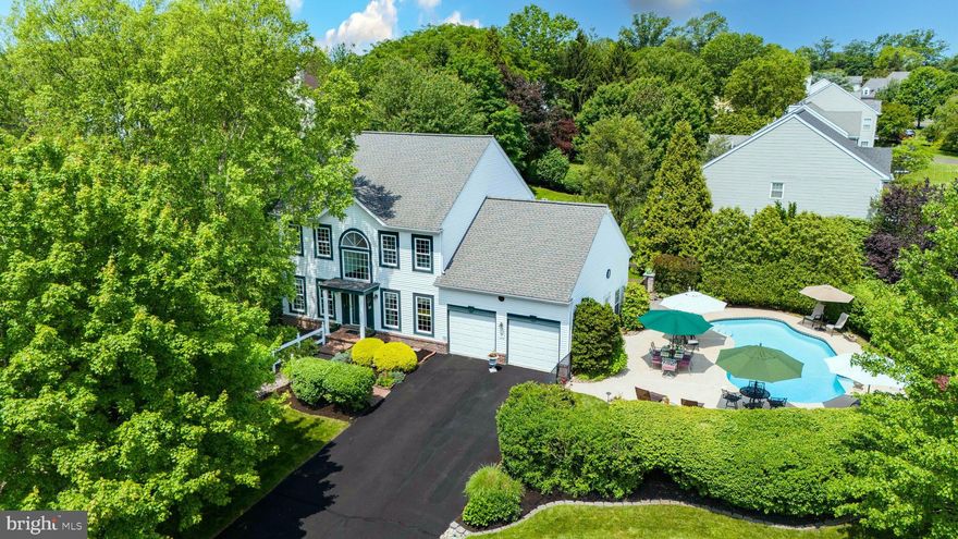 Welcome to 220 Cypress Lane, a beautifully appointed residence in the highly sought-after Hidden Creek community of Horsham Township, offering an exceptional blend of luxury, comfort, and privacy on a prime lot with no front or side neighbors. This elegant 3-bedroom, 2.5-bath home is nestled on a park-like property surrounded by lush, mature landscaping that creates a tranquil and secluded setting. A grand two-story foyer welcomes you inside to a thoughtfully designed layout featuring a sun-drenched sunroom with vaulted beamed ceilings, a finished basement with two custom bar areas perfect for entertaining, and a stylishly updated primary bath with a marble-tiled walk-in shower and upgraded vanity with dual sinks. Step outside to your private backyard retreat, where a fenced-in, in-ground pool is framed by beautifully manicured landscaping and features a newer pump and filter. Adjacent is a spacious rear paver patio with retractable awnings for shaded relaxation, a charming pergola sitting area atop a brick patio, and a serene flagstone pond corner that completes the outdoor oasis. With a 2-car garage, driveway parking for four, and located in a mature, walkable neighborhood known for its peaceful setting and community charm, 220 Cypress Lane presents a rare opportunity to own a private sanctuary in the heart of Horsham Township.