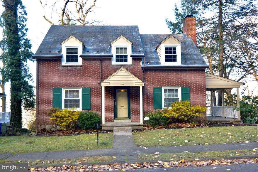 Hampden Heights Brick Colonial, Mt. Penn reserve accross the street, 100's of wooded acres with trails. Large living room with wood fireplace, 3 large bedrooms, hardwood floors throughout. Replacement window, gutter guards,, side porch, gas heat. Hot water heater replaced, newly painted. Walk to schools K-12, near Albright College.