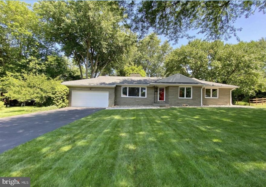 Classic mid-century modern stone clad ranch(er) situated on approximately 1/2
acre in a lovely quiet neighborhood. House features a brand new 350 square foot
composite deck (with CO) and includes a 12 X 12 utility shed in the rear. Summer
shade provided by maple, dogwood and magnolia trees.

Interior with 3 large bedrooms, and the master has a full ensuite bath with tub
and separate shower, a second full bath is in the hall. Ample windows of the M-C
style are double paned, screened and provide plenty of natural light and
panoramic views. There is a large living room with pellet stove for cozy days and
nights, a well-kept kitchen with charming original Quaker Maid cabinets. A full
dining room for family and guests. The attached two car garage enters into a
hall/mudroom off of which is a library/study.

There is a new LG stack washer dryer off the hall for convenience and another
washer dryer in the full basement below. This large basement has some built-in
cabinets as well as its own stone fireplace. A very efficient Buderus furnace
provides both heat and hot water and there is a well storage tank. The basement
has both an interior stairway and a Bilco Door to outdoors. The exterior is well lit
with area lights.