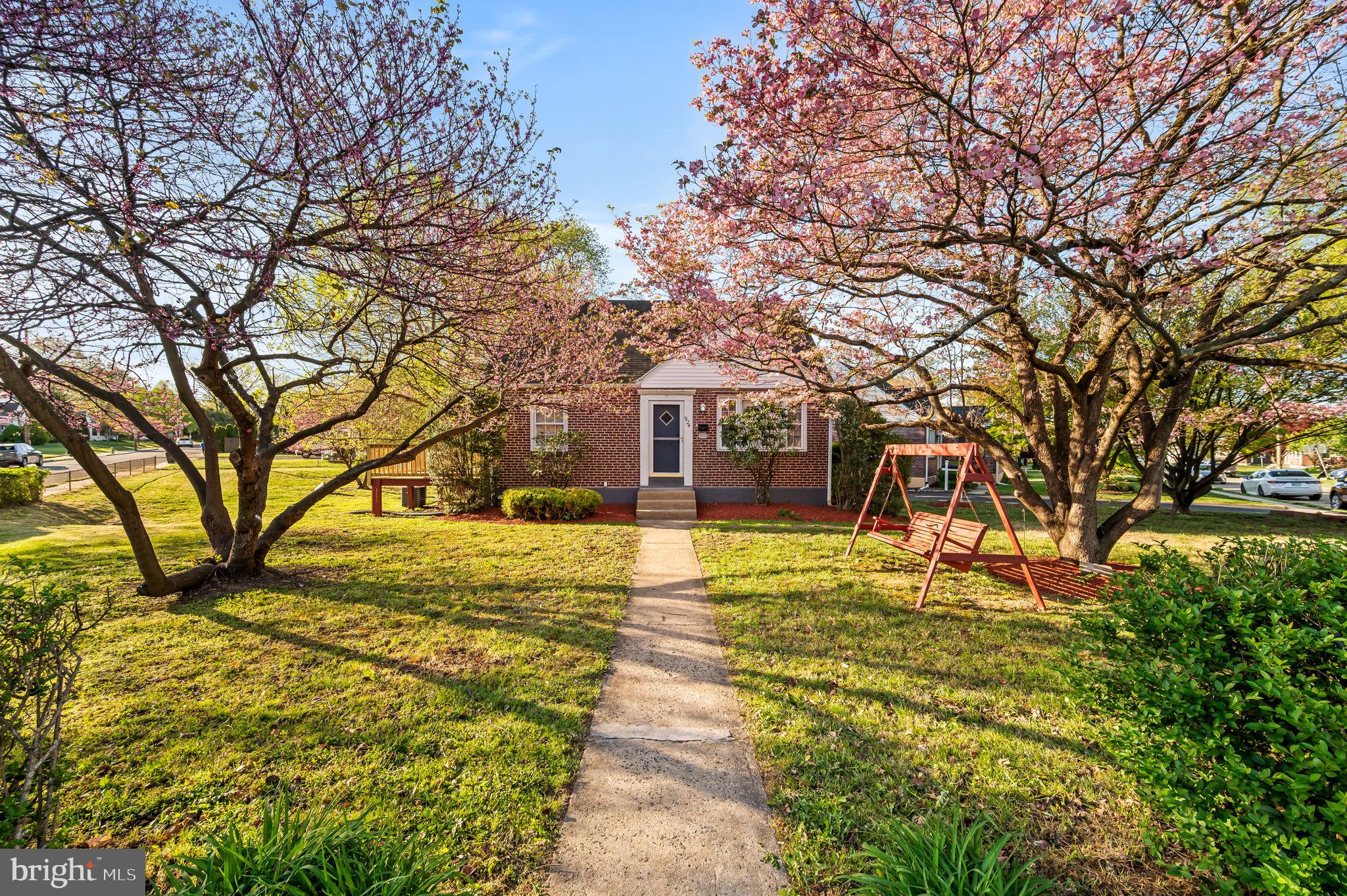 Welcome home! This expanded cape style home offers over 1,700 sq ft of living space and is located on a super sized corner lot in one of the nicest neighborhoods. The solid brick home has been remodeled throughout with a brand new 21 x 28 ft deck adding another 800 sq ft of outdoor living space. This home has so many amazing spaces to meet your every need. The first floor has luxury vinyl plank floors, a large living room, a formal dining room or 1st floor family room, and a beautifully updated kitchen with custom cabinets, some glass doored cabinets for display, quartz countertops, glass tiles backsplash and stainless appliances. The first floor also features a primary bedroom with private ensuite access to the updated full bathroom. The second floor has two lovely bedrooms and a new full bathroom and lots of storage. The lower level is enough to make your mouth water with an open 24 x 23 great room perfect to host every party, gathering or special event. Talk about a place to entertain, the lower level has a knotty wood bar with wet bar, refrigerator & wine glass racks. The lower level features a private room that can be used as a 4th bedroom, home office or guest room, a laundry room area and a half bath. The whole house offers recessed lighting, crown molding, new appliances, brand new high efficiency gas heater, new roof will be installed prior to settlement, new flooring, new hardware and so much more. The incredible yard is your own private oasis. Super convenient to highways, schools, parks, ballfields and more.