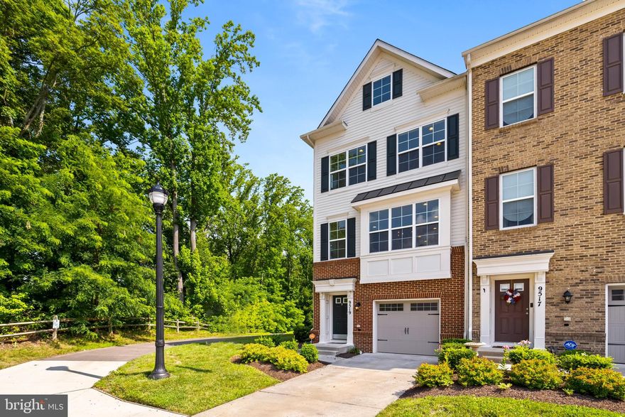 Fall in love with this 3-level end unit townhome with over 2700 sq ft of total living space! You'll relish entertaining in this beautiful home with open and inviting spaces on every level. Enter into this modern beauty that features wood floors in the living room and dining room. The heart of the home is the kitchen and family room. Spacious and open, with stainless steel appliances, granite countertops, and center island, this is a true stunner! Relax in your spacious living room with tons of windows that bring warmth and luster into the home, Retire into your Owner's Suite featuring walk-in closets, en suite with a stunning soaking tub, separate shower, and double vanities. Enjoy endless summers or cool autumn evenings on the huge spacious deck. The fenced in yard completes this home. This is a must see.