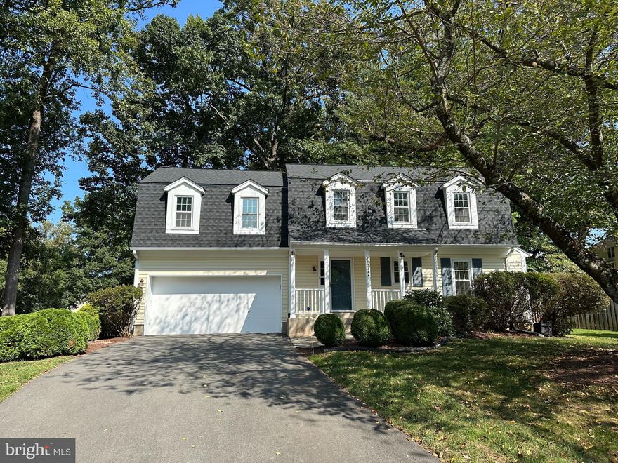 Turn-key colonial with 3 bedrooms, 2.5 bathrooms and a finished basement nestled in the heart of Fairfax, Virginia. This charming property greets you with warmth and curb appeal, starting with its picture-perfect front porch—ideal for sipping your morning coffee or unwinding after a long day. Step through the front door and be greeted by newly refinished hardwood floors and plush new carpeting. The spacious kitchen with room for a breakfast table overlooks a bright and airy family room, featuring vaulted ceilings with skylights, wet bar, and a wood-burning fireplace that creates a warm, welcoming ambiance. A formal dining room with large windows bathe the room in natural light, adding to the home’s welcoming environment. Enjoy seamless indoor-outdoor living as you step from the main level into the fenced-in backyard, complete with a paver patio—ideal for BBQs or a relaxing evening. Upstairs, the generous primary bedroom includes an ensuite bathroom, two additional spacious bedrooms and a full bathroom to accommodate family or guests. With over 2,700 sq. ft. of living space, there’s plenty of room to spread out. This home also features a versatile finished basement, providing endless possibilities—whether you envision a playroom, home theater, gym, or additional living space. There’s no shortage of storage either, with ample closets and a two-car garage to meet all your needs. Beyond the home’s beauty and functionality is its unbeatable location situated just off West Ox Road and Route 50, with quick access to Fairfax County Parkway. You are just minutes from nearby restaurants, grocery stores, shopping, and entertainment at Fairfax Corner and Fair Lakes. All major systems recently updated; The roof was just replaced in August of 2024 with new gutter screens installed, fresh paint, new carpeting, refinished hardwood floors, and a brand-new stove installed, this home is truly turn-key. Carrier HVAC system installed 2019. State Hot Water Heater 2021. Don’t miss the chance to make this Fairfax gem your own—a perfect blend of classic colonial charm, modern updates, and an unbeatable location!
