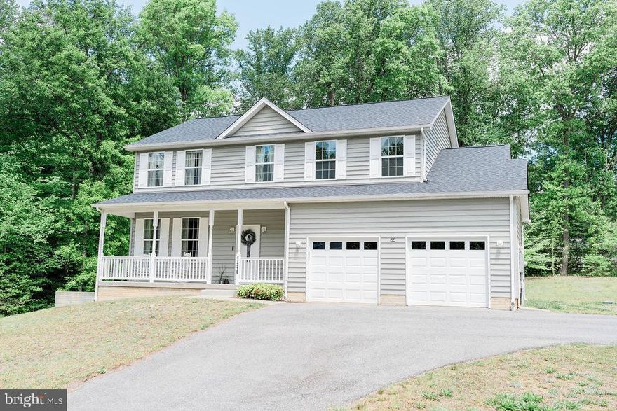 Welcome to 41210 Devyn John Way! A 6 year young, 3000+ square foot house on 5.55 acres with no HOA. This is your opportunity to grow into the house and area of your dreams. The possibilities are endless for you to put your own stamp on this house, or move right into this beautiful home and enjoy it for years to come.  
This well maintained home has 4 bedrooms and 3 bathrooms in a sought-after area of Mechanicsville. Custom Built in 2017, it is at the end of a quiet, well taken care of street with no HOA. The main level of this home has an open concept family room and kitchen with a dining room attached. The upgraded kitchen includes granite countertops, stainless steel appliances, a gas range, and an oversized island. A half bath, a mudroom off of the garage entrance, and access to your very private back yard also on this level. The top level of the home has a primary suite with attached full bathroom- complete with soaking tub, large shower and separate vanity. The rest of the top level includes 3 bedrooms each with oversized closets, another full bathroom and laundry room. The lower level of this home is a walk out, fully finished basement with a rec area/ family space, with a closed off gym area that could convert to a bedroom in the future plus ample storage. There is also plumbing in place for a future basement bathroom if desired. The basement has been wired for your own private movie theater complete with large projection screen hook ups for those big game days or movie nights. The roof was upgraded when built to a 30-year high wind resistant roof.  This home has been freshly painted and is ready for it's new owners. Don't miss out on this beautiful property in Mechanicsville, schedule a showing today!