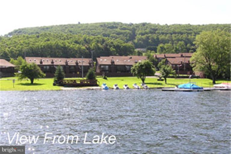 Best Sunsets on Deep Creek Lake! Enjoy beautiful Lake & Ski Slope views from this 3 bedroom 2.5 bath home in the Sunplace community of DCL. Sunplace offers 325 feet of private lakefront w/ boat slips, jet ski ramps, lakeside pavilion, sandy beach & an indoor pool. Established Vacation Rental! Call today for more info.