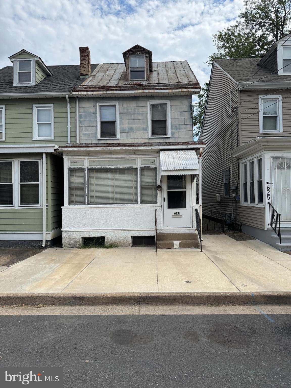 End unit row home with great potential! This 3-bedroom, 2-bathroom property features a full basement and detached garage/shed, offering plenty of space inside and out. The home needs significant renovation but is priced as an excellent value for investors or handy owner-occupants. Prime location just 1 block from Snyder-Girotti Elementary School and 4 blocks from SEPTA’s Bristol train station, making commuting to Trenton, Philadelphia, or even NYC a breeze. Fantastic investment opportunity in a convenient location!