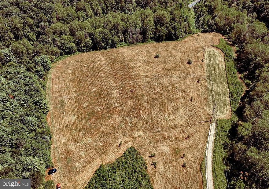 Unlock the potential of 28 pristine acres perched atop the rolling hills of northern Westminster. This expansive parcel offers developers a rare opportunity, already perc-approved for a seven-lot subdivision and equipped with onsite forest conservation requirements fulfilled. Boasting breathtaking countryside views and a perfect blend of tranquility and accessibility, this property is an exceptional investment for visionary builders.
Please note that current access is limited to foot traffic without the listing agents escort. 
For more information or to schedule a guided visit, please contact listing agent. Independent explorers should be prepared for a walking tour of the hillside and property, as vehicle access is not currently available.