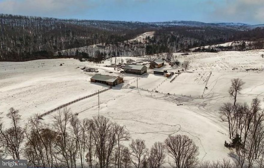 This is a MUST SEE PROPERTY! 2 Homesteads, 3 Ponds, 2 Creeks, Picnic Area.  Homestead #1 = 2 story fully wired 4 Bedroom House, Homestead #2 = Barndominion with 5 Bedrooms!  Greenhouse, Equipment Shed, Sawmill Building, 9-Boxstalls for Horses.  Great Opportunity with 183 acres of Unrestricted Land.