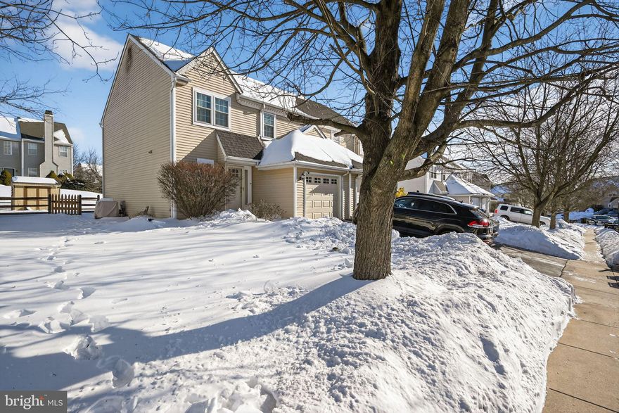 This well-maintained home offers a functional layout with inviting, comfortable living spaces throughout. The first floor features hardwood flooring and a welcoming front hall that opens to a combined living and dining area—well suited for both everyday living and casual entertaining. The dining room includes a sliding glass door to the patio and backyard, providing natural light and easy indoor-outdoor access.

The kitchen is equipped with stainless steel appliances, gas cooking, granite countertops, a stone backsplash, and tile flooring. Open to the dining room, the kitchen features a large countertop area that enhances flow and functionality, making it ideal for meal prep, serving, and gathering. A first-floor laundry room and powder room complete this level.

Upstairs, the primary bedroom offers a walk-in closet and  private ensuite bath with a soaking tub, walk-in shower, dual ceramic-sink vanity, and linen pantry. Two additional bedrooms and a full hall bath complete the second floor.

The finished basement adds valuable additional living space with a combination of carpet and tile flooring and a gas fireplace—perfect for a family room, home office, or recreation space. There is also valuable additional storage space in the basement.

Outside, the fenced-in backyard includes a shed for convenient additional storage. This home is minutes from 422, offering easy proximity to the Providence Town Center with Wegmans, the Movie Tavern, and an array of dining and shopping options; King of Prussia; the Philadelphia Premium Outlets. Located in the award-winning Spring-Ford Area School District.