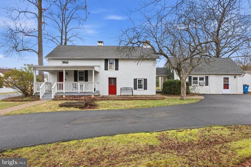 Charming Bucks County Farmhouse on 1 Acre in Desirable Warwick Township
 
Set on a picturesque, park-like acre in sought-after Warwick Township, this beautifully updated and expanded farmhouse blends timeless charm with modern convenience. A circular driveway, split-rail fence, and inviting covered front porch create a warm and welcoming first impression.
Inside, the home features 4 bedrooms, 2 full baths, and 1 powder room, along with thoughtful details throughout including front and back staircases, a second-floor laundry room, and hardwood flooring.
 
The oversized eat-in kitchen offers abundant space for gathering and opens through sliding doors to a stunning 43’ x 12’ Trex wraparound deck and brick patio—perfect for entertaining or relaxing while enjoying the scenic surroundings.
The main level includes a formal living room with a restored gas fireplace and stone surround, a formal dining room with a walk-in fireplace, and a spacious family room accented by charming knotty pine walls.
 
A separate carriage house provides an additional 400+ square feet and includes a powder room—ideal for a home office, gym, artist’s studio, or potential in-law suite.
Located within the desirable Jamison Hunt neighborhood, enjoy walking paths leading to playgrounds, tennis courts, and Dark Hollow Park with its peaceful fishing pond. Just steps from Warwick Elementary and St. Cyril’s Church, and minutes to The Bucks Club’s 18-hole golf course, local restaurants, and nearby vineyards.
Significant past upgrades include public sewer connection, gas heat, updated HVAC, windows, roof, and more—offering peace of mind for years to come.