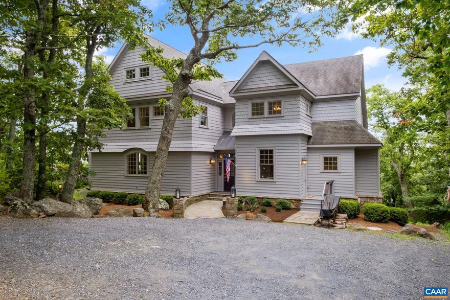 Perched near the highest point at Wintergreen with unsurpassed views of the south western Blue Ridge is truly one of the most spectacular mountain homes you will find anywhere! From the moment you enter you are struck by the panoramic view perfectly framed by the floor to ceiling windows and then by the overwhelming beauty, quality, craftsmanship, and quiet luxury of the Post and Beam style great room before you. The open floor plan seamlessly flows from the living/dining area with 10 ? wood ceiling , exposed beams, suspended cable lighting and massive stone fireplace to the dream chef?s kitchen, island, breakfast nook and bar. On the other side and sharing the fireplace is a cozy family room and game area leading on to the expansive Trex deck with glass panels and hot tub. Also leading on to deck is the main level primary bedroom suite and upstairs 2 more primary suites all with spa baths and views. The upstairs open den has an amazing view and off it 2 smaller bedrooms or offices with baths and a sleeping loft. An architectural ?gem? beautifully maintained, handsomely furnished and with the most coveted view and location at Wintergrern! This is the one you?ve been waiting for! Open House 9/4/23  10:00-3:00,Glass Front Cabinets,Painted Cabinets,Soapstone Counter,Wood Cabinets,Wood Counter,Fireplace in Family Room,Fireplace in Great Room