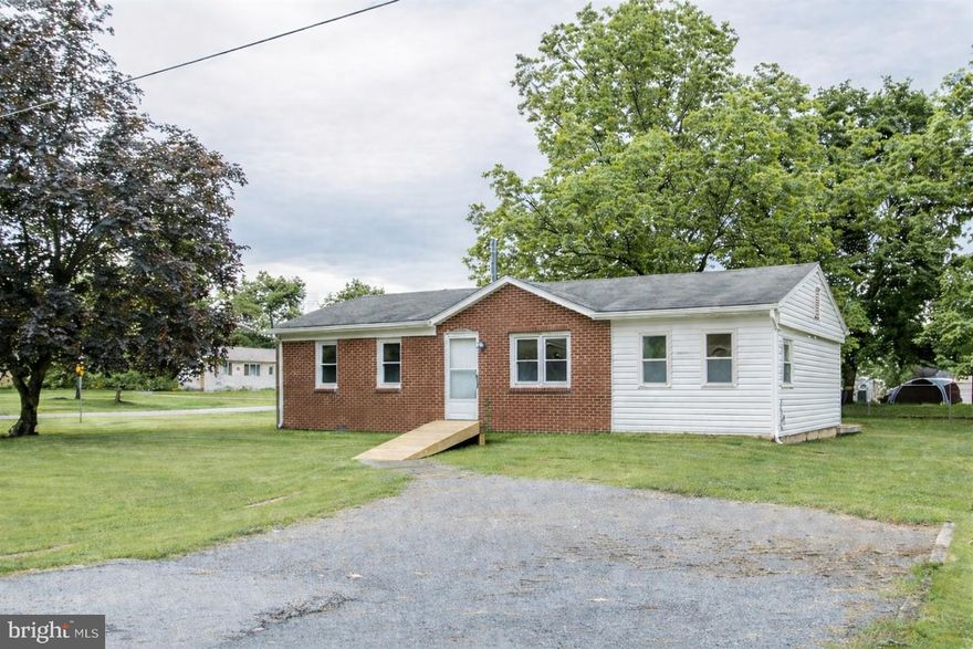 One-level, move-in-ready brick ranch located in the town of Luray, with easy access to the US 211 Bypass and US 340—just 10 minutes from Shenandoah National Park. The primary bedroom features an attached bath with shower and a walk-in closet. Bedrooms two and three share a full bath with a tub/shower combination. The kitchen opens to a rear porch, perfect for relaxing or entertaining. Public water, sewer, and trash pickup. No HOA.