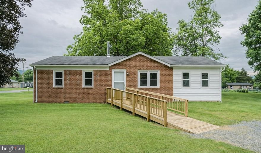 One-level, move-in-ready brick ranch located in the town of Luray, with easy access to the US 211 Bypass and US 340—just 10 minutes from Shenandoah National Park. The primary bedroom features an attached bath with shower and a walk-in closet. Bedrooms two and three share a full bath with a tub/shower combination. The kitchen opens to a rear porch, perfect for relaxing or entertaining. Public water, sewer, and trash pickup. No HOA.
