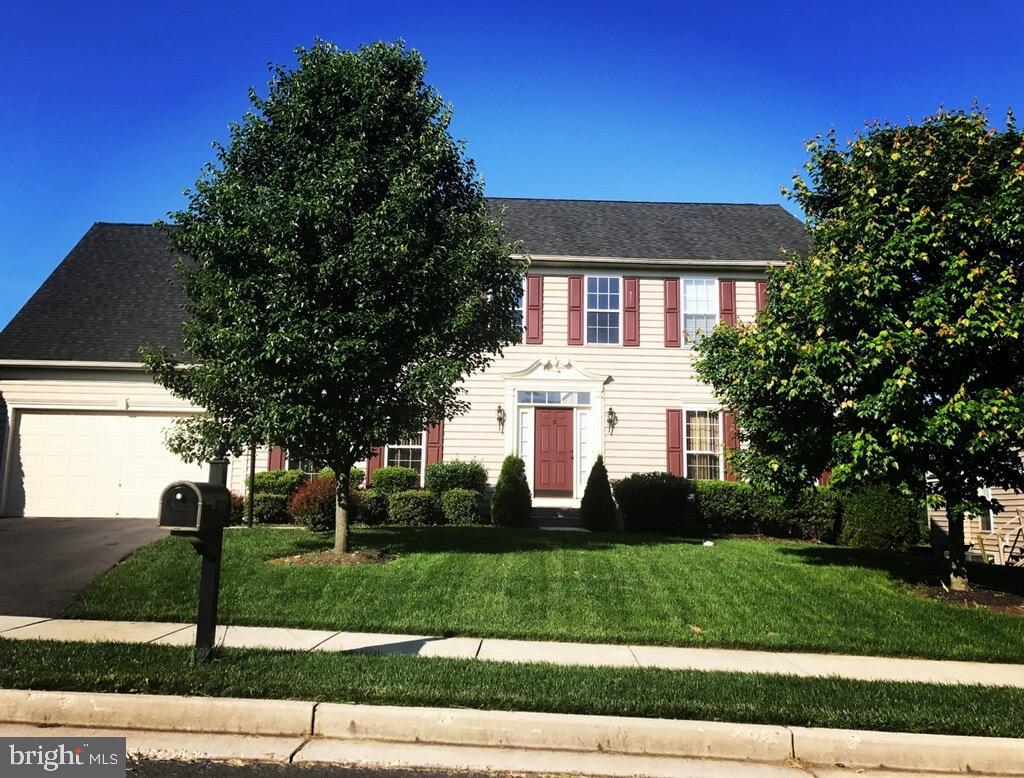 Nestled in the charming Archers Rock community, this stunning Colonial-style home offers a perfect blend of comfort and modern living. Built in 2007, this spacious residence boasts 4 bedrooms and 2.5 bathrooms, providing ample space for relaxation and entertaining. The inviting interior features plush carpeting and elegant ceramic tile, complemented by upgraded countertops and cabinets in the kitchen, which is equipped with stainless steel appliances, including a built-in microwave and gas range. Cozy up in the living room by the fireplace, or enjoy the tranquility of the wooded views from your windows, creating a serene backdrop for everyday life. With a generous 3,274 sq. ft. of finished space, the unfinished basement offers endless possibilities for customization. The home is equipped with modern conveniences, including a central vacuum system. Outside, the 0.27-acre lot provides a lovely space for outdoor activities, while the attached garage and driveway accommodate multiple vehicles. Located in a vibrant neighborhood, residents enjoy easy access to local amenities, parks, and shopping, making this home a perfect retreat for those seeking both comfort and convenience. Experience the warmth and charm of this delightful property-your new beginning awaits!