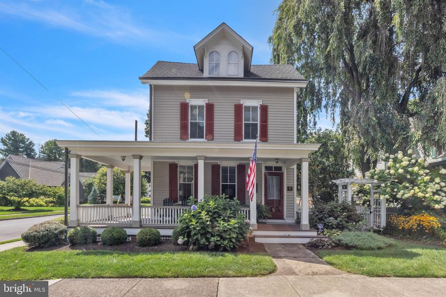 Located in the heart of Newtown Borough on one of the nicest streets you will find the “Radford House” originally built in 1884 and winner of the 2008 Newtown Boro Historic Preservation Award. This 4-bedroom 3.5 bath charmer begins with the mahogany wrap-around porch with its timeless elegance. As you enter this incredible home you will start in the cheerful living room, enhanced by front and side windows making this room very light bright.  Continue to the back of the home through the arched entryways past the staircase to the open concept “Great Room” for the 2023 minded buyer. Working in the kitchen is no longer a lonely chore, it’s an inviting fun place to, prepare, cook, socialize and enjoy gatherings.  At the center of the kitchen is a large center island with an abundance of workspace that adds an additional place to prep with an overhang for seating.  An added window seat located to the side is bonus. The Kitchen additionally features premium appliances with a hooded exhaust, furniture quality cabinetry with granite tops, subway tile backsplash with decorative inlay, pendent lighting, recessed lighting, 6 burner gas range, an abundance of windows for natural lighting and a door access to the back and side yards.  The less formal dining area of the great room is large enough for ample seating for entertaining.  A powder room can be found just off of the “great room”. The features and upgrades are fitting of a home of this quality and charm. As you travel upstairs to the primary suite you will find custom built-ins, wainscotting, 2 walk-in closets, a dressing area, a large bath with a soaking tub and an extra-large shower. Three more Bedrooms and two full updated baths complete the home. Restored in 2008 by a master craftsman, highlighted features include remodeled upgraded kitchen, replaced baths, replaced flooring, replaced electrical, plumbing, 2-zoned climate control, restored period windows, Tyvek sheathing and fully stained cedar siding. The benefits are endless with the melding of the new and still keeping with the charm of 1884. The gated and fenced garden with the bluestone patio offers a private setting for enjoying the outdoors. The home includes a private 2-car driveway and street parking.  This award-winning home is a short walk to the charming main street, restaurants, walking tours, theatre, shops, and Council Rock Schools. There is a complete ease of commuting yet quietly tucked away from the hustle and bustle of town. community.