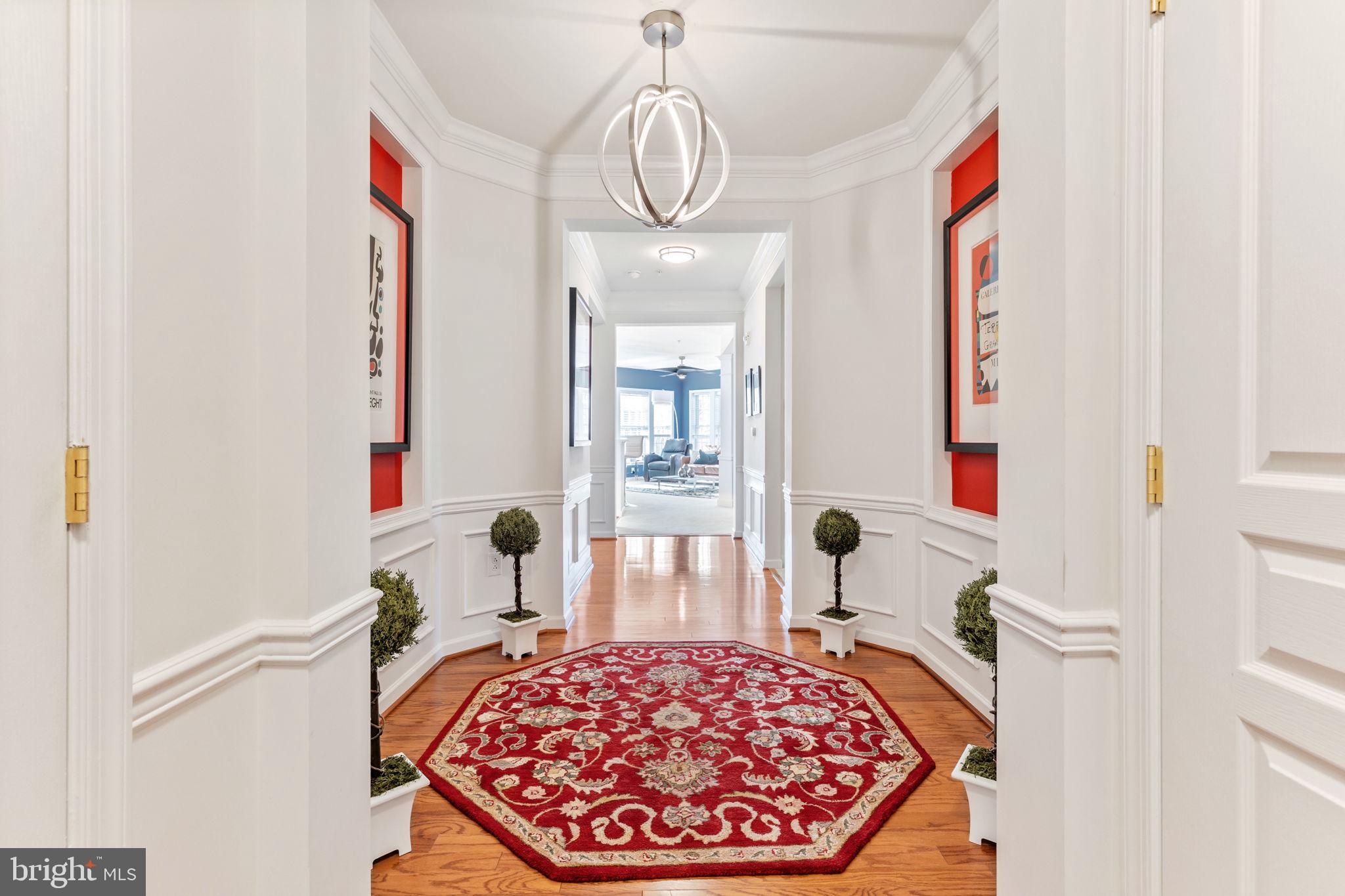 Welcome to this exquisite 2-bedroom, 2-bathroom Anthem model condo situated in the prestigious Reserve at Gwynedd. Upon entering the lobby, you will be immediately captivated by the sheer elegance of this residence. Elevate to the third floor, where meticulous attention to detail is evident in every aspect of this home. Polished hardwood floors guide you through an elongated hallway, providing an ideal backdrop for your art collection. This corner unit is flooded with natural light, thanks to an abundance of windows that showcase breathtaking views of the green of summer trees, the fall foliage, the winter snow, and spring blooms. The generously proportioned living room seamlessly flows into a gourmet eat-in kitchen featuring 42” cabinetry, stainless steel appliances, new quartz countertops, and a striking black subway tile backsplash. The adjoining dining room is nothing short of extraordinary, making it the perfect venue for hosting year-round gatherings. Step out onto the private balcony from the living room, extending your entertainment space outdoors. The spacious master suite boasts trey ceilings, a walk-in closet, and an ensuite bathroom, creating a spa-like retreat. The second bedroom, complete with a full bathroom, offers versatility as a guest room or office space. Ample closet space and a sizable laundry room enhance the functionality of this residence. Your security and convenience are ensured in this gated community with private lobbies in each building. Additionally, this home includes a deeded parking space and a storage locker. The building maintenance fee covers essential services such as snow removal, trash removal, water, sewer and additional parking. As if these features weren't enough, prepare to be enchanted by the array of amenities in this Active Lifestyle Community. Enjoy access to an outdoor pool, indoor pool, hot tub, exercise room and community room, providing numerous opportunities for social gatherings and recreation. One additional bonus is the average PECO bills (including gas and electric) average only $135 per month!