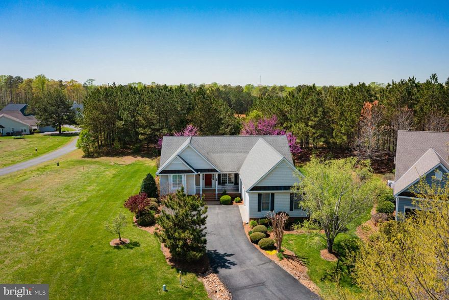 Maintenance free, one level living with a fabulous floor plan in the sought after community of Hills Quarter! This home boasts an entry foyer opening to a living room with vaulted ceiling and gas fireplace and a separate dining room. The large eat-in kitchen and breakfast area overlook a landscaped, private back yard and provide access to a lovely three season room. The large primary suite, which comprises the left side of the home, includes 2 walk-in closets and an ensuite bath with 2 vanities, jetted tub and separate shower. The right side of the home includes two well-sized bedrooms, a full hall bath and a separate laundry room leading to a 2 car garage. This home is move-in ready, offering not just a property but a community with amenites to include a pool, clubhouse, tennis courts, walking trails, lawn maintenance and trash pickup!