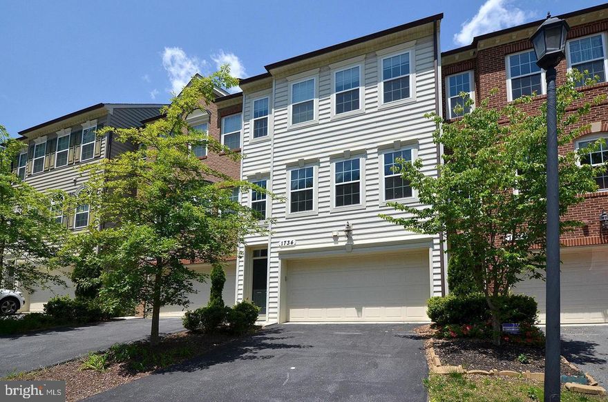 Spacious 3-level  townhome with 9' ceilings and 2 car garage. Large gourmet eat-in kitchen w/ stainless steel, granite, hardwood, and island. Large primary bedroom suite with huge walk-in closet and en suite bath w/ separate tub and shower. Finished basement with full bath. Conveniently located close to ICC, 495, DC and Bethesda, FDA Campus,  and NIH. 30 min drive to Fort Meade.