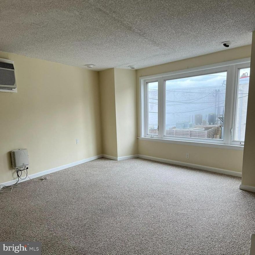 This First Floor space is also zoned commercial so it's usage could also be rented as a small business space. Renovated kitchen and bathroom. It's the perfect location in the center of town. Convenient to public transportation, restaurants, shopping and more!  Use the RentSpree link associated with this property, t