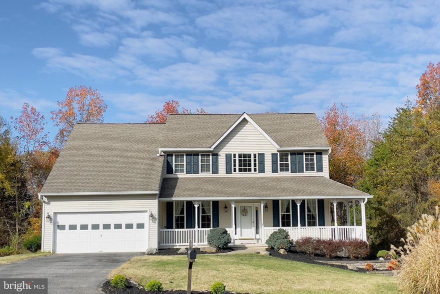 Come home to this charming colonial house perfectly nestled in a cul-de-sac, in the highly sought after North Point School district. With a spacious enclosed /screened-in porch and open deck that backs up to the woods, it's perfect for entertaining. Laundry room is on the upper level for ultimate convenience.  Many updates including kitchen appliances, renovated primary bathroom with a double vanity quartz counter-top, spa tub, glassed in shower with multi-function shower tower.  Unfinished walk-out basement prepped with plumbing rough-ins to add an additional bathroom if desired. ***MUST SEE***