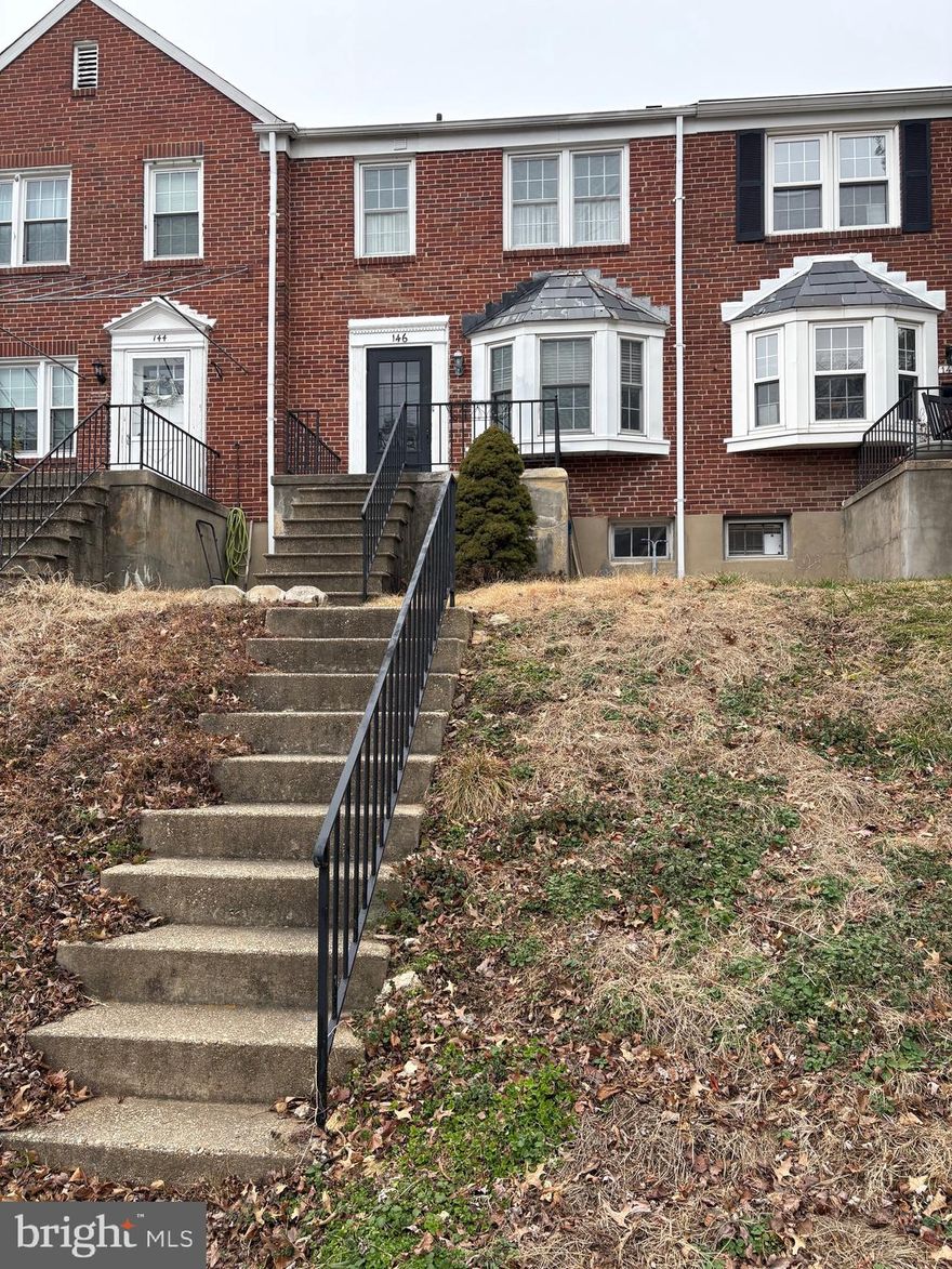 Discover this delightful brick colonial townhouse nestled in the highly sought-after Rodgers Forge community — one of Baltimore County’s most desirable neighborhoods, renowned for its charm, tree-lined streets, and award-winning Blue Ribbon schools.

Inside, you’ll find a bright and inviting first floor filled with natural light and rich hardwood flooring throughout. The comfortable living and dining areas flow seamlessly, offering the perfect setting for everyday living or entertaining.

Upstairs, enjoy three well-proportioned bedrooms and a beautifully maintained full bath. The lower level offers a spacious finished room with plenty of natural light — ideal as a family room, home office, or guest suite — complemented by a convenient half bath. The utility area features laundry facilities and ample dry storage.

Outdoor living is effortless here, with a welcoming front porch overlooking the trees and scenic Dumbarton Road, plus a large rear deck perfect for relaxing or hosting gatherings. A potential parking pad adds convenience, or you can easily park in the alley beside the fenced backyard.

This is a rare opportunity to own a home in one of Baltimore County’s most beloved communities — classic architecture, strong neighborhood pride, and top-tier schools all come together here in charming Rodgers Forge. More photos coming soon.