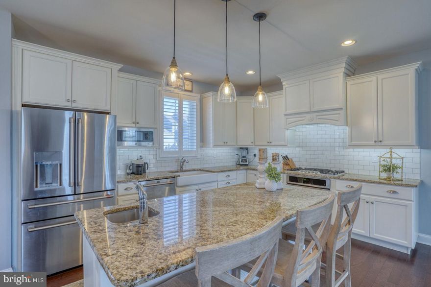 Welcome to 513 Spring Hollow Drive, located in the sought after neighborhood of PARKSIDE where manicured lawns, breathtaking Grand entrances.... that shout our pure elegance and landscaped open areas that are where you can imagine your family loving where they live.  This stunning Semi Custom home in situated on a great corner lot that is across from the Parkside Community Clubhouse, pool, fitness center, playground, tennis, pickleball and 8 acres of open space to go play....location, location and location!!!! Let me not forget to mention the Appoquinmink School District ....the shopping and the great distance to all the major highways.   Come on in and take a look.....Built in 2017, a Lifestyle home that the owners designed with so many upgrades.  Enter into the lovely hallway that separates the formal front room and large study with French doors....LOOK AT THESE HARDWOOD FLOORS throughout the main living area...one of the largest family rooms with a gas fireplace, open concept living, great size eating area and ......THE KITCHEN..... this is the heart of the home with a large island, quartz counter tops, custom hood, a PANTRY that is a WOW....great natural light from windows galore....another back room (flex room, bedroom, toy room, or 2nd office)  lets not forget the 2 great back exits... one to the lovely patio in the fenced in yard the other is to the 2 car garage. Where do we go next...Upstairs has 3 lovely sized bedrooms, a extra large laundry room and 2 full bathrooms.....The primary suit is just beautiful with its own entrance into the laundry room from the large closet.  The basement the owners finished custom on their own after......this is where the fun begins...great large recreation room, full bath, fitness room and still tons of storage.  Put this on your list of perfect homes!!!! BRAND NEW ROOF!!!!