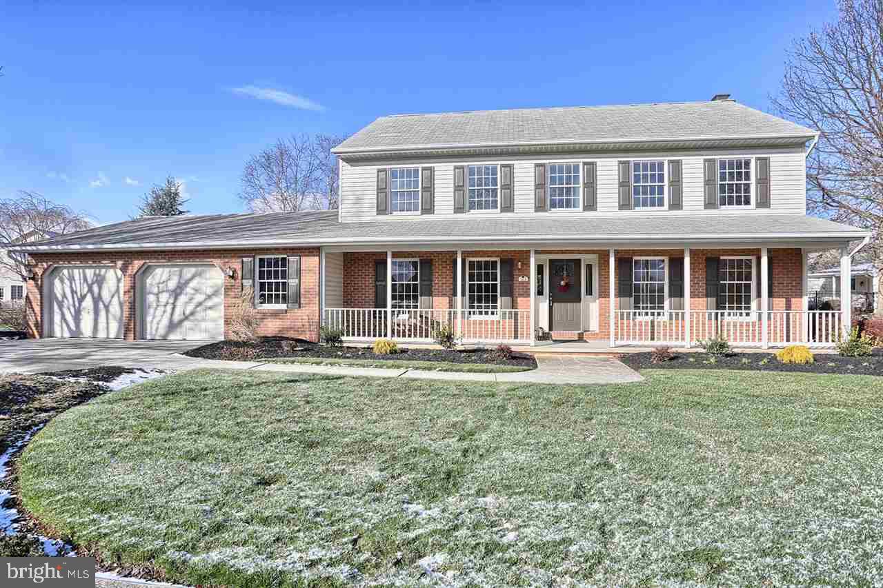 Your search starts and ends with this spacious, well maintained Mumper built home in the desirable Green Lane Manor, West Shore School District! The heart of this home is the warm and inviting kitchen, open to both a family room with fireplace & built-in shelving as well as a light-filled sunroom. Beautiful hardwood floors grace most of the rooms on the 1st level. Updates include efficient natural gas heat installed in 2013 and new carpet in family room. Don't delay, schedule your showing today!
