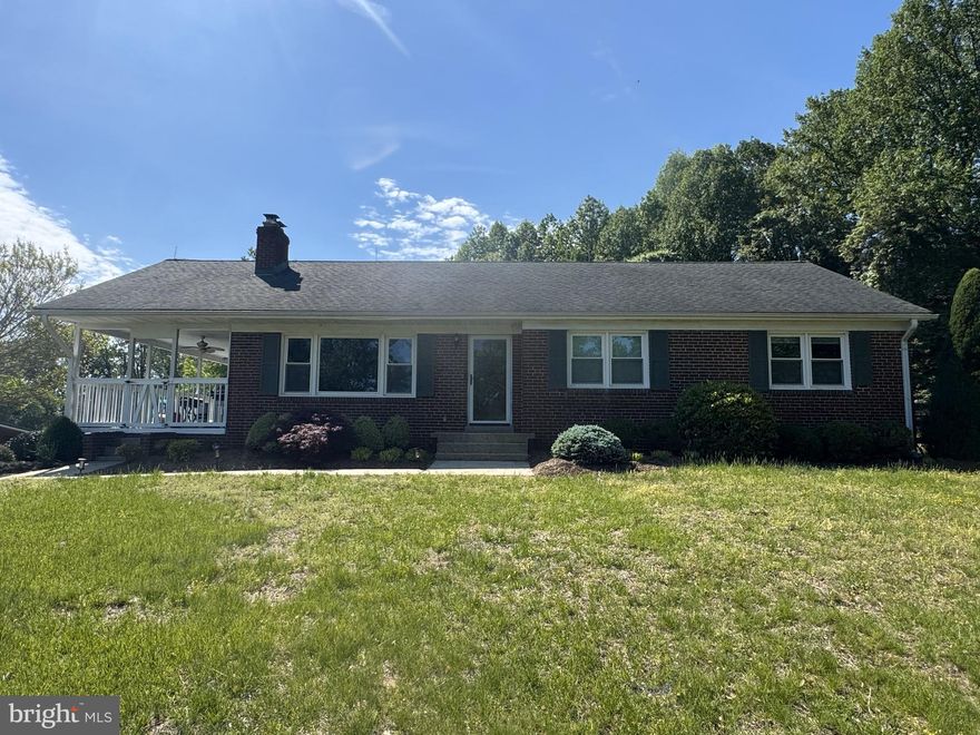 Welcome to Your Brandywine Retreat.  Escape the city to this stunning retreat in Brandywine, nestled on over 5.27 acres of picturesque land. Surrounded by the natural beauty of rolling hills, you'll enjoy sweeping panoramic views, including farmland and nearby wineries. A paved driveway leads you directly to the home.

The custom 40'x48' pole barn, built in 2019, boasts a 10' overhang. According to the owners, its engineered plans exceed both state and county standards. Inside, you'll find a built-in workbench along one side and an oversized hayloft capable of holding 1200 standard square bales, with double-sided access for easy loading and unloading.

For your animals, there are a couple of tongue-and-groove horse stalls with partial matting, each leading out to individual 12'x20' covered corrals. The barn features rolled millings throughout, electric, and water, with easy access to all utilities. There's ample space for a couple of horses, chickens, and perhaps a few goats.

Approximately 3 acres are fenced with a no-step perimeter fence, complemented by an electric topline and interior fencing. Three separate smaller paddocks share a centrally located hydrant.

Enjoy country living at its finest with plenty of fresh air and a beautiful view from your front covered porch, complete with fans. This is your very own manageable farm, all with no HOA!