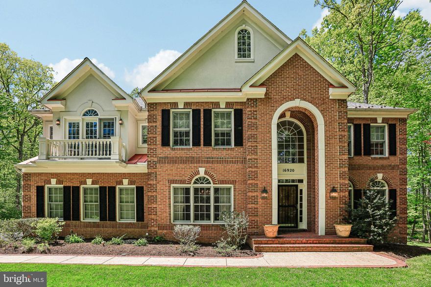 Set on a picturesque, wooded 1.25 acres in sought-after Howard County, this exceptional brick luxury home offers over 6,000 square feet of refined living space, seamlessly blending elegance with modern comfort. A stately façade and manicured grounds create a grand first impression, leading into a light-filled interior highlighted by high ceilings, rich hardwood flooring, and wonderful architectural details throughout. The two-story family room is anchored by a stunning floor-to-ceiling brick fireplace and framed by expansive windows that capture serene wooded views in every season.
At the heart of the home, the gourmet kitchen is designed for both everyday living and entertaining, featuring custom cabinetry, expansive granite countertops, a large center island with seating, and an open flow into the main living areas. The home offers generously sized bedrooms and 4.5 baths, including a luxurious primary suite, with separate sitting area.  Complete with a spa-inspired bath showcasing a glass-enclosed shower, soaking tub, and dual vanities. Upstairs, an open overlook adds to the home’s open feel, while the lower level provides additional versatile living space ideal for recreation, a home gym, or guest accommodations. Outside, the private, tree-lined setting creates a peaceful retreat, perfect for relaxing or entertaining on the deck while enjoying nature views year-round. Complete with a two-car garage, over 6,200 total square feet, and located within beautiful Howard County, this home offers an unparalleled combination of space, privacy, and elegance—just moments from major commuter routes, shopping, and dining