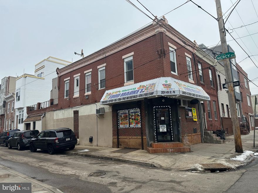 Corner building with 1-car garage and roof deck, MIX use zoning, first floor : long-standing grocery operated many years, it has daily grocery , Lottery , game play machines, cold food........ stable income. second floor : 2 bedroom apartment, 2 large size bedrooms.