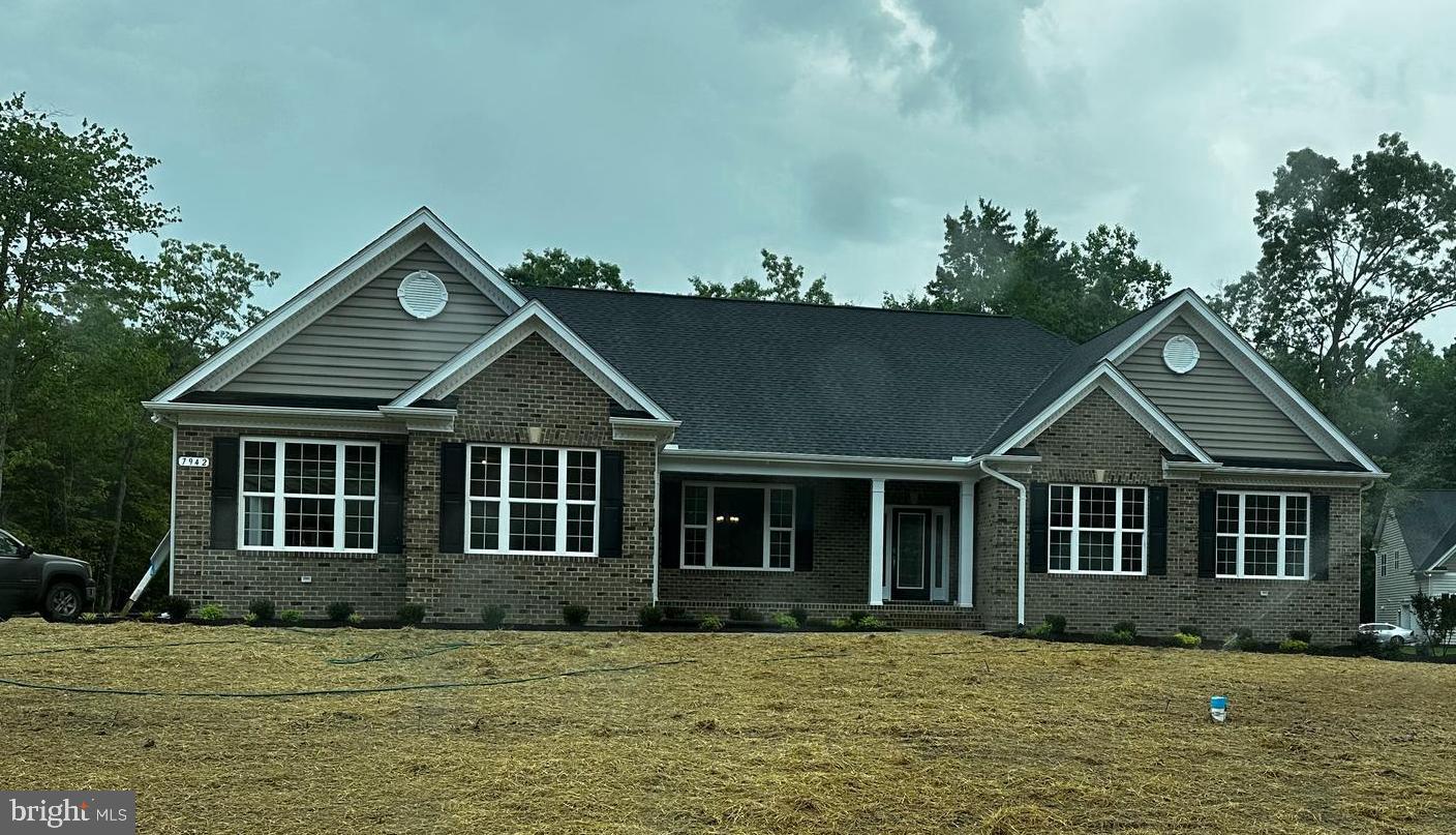QBHI's Winchester with Brick front on lot 30 Fischer's Grant. 4 bedrooms on the main level. Upgraded kitchen, 2' rear extension, Family room with gas fireplace and tray ceiling. 2.5 car sideload garage, mudroom with laundry on main level. Basement has plenty of storage along with a large rec room and full bath