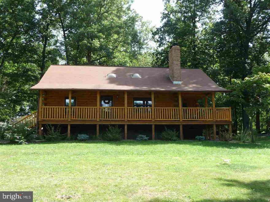 Fabulous 3 BR, 2 BA log home in excellent condition sitting on a 1.6 acre private wooded setting. Featuring a wrap-around porch on 3 sides to enjoy the scenic views, 2 car oversized detached garage, 2-1st floor bedrooms and full bath, and more. Valley Forge Wood stove is add on to oil furnace.1/2 Mile to Pleasant Valley Golf Course. Only 6 miles to I-83.