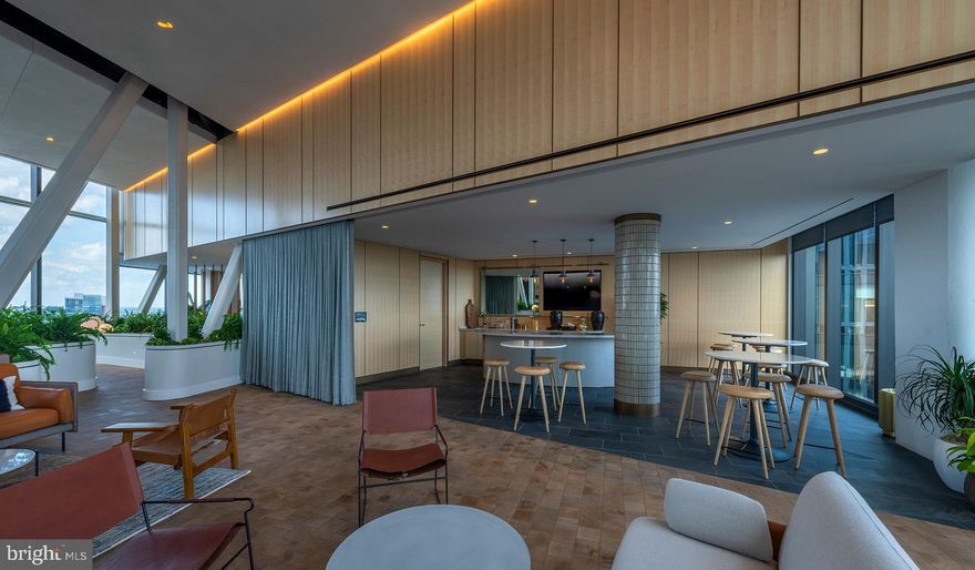 Experience the Pinnacle of Urban Living at The Elm, Bethesda

Nestled in the vibrant heart of Bethesda, adjacent to the bustling Bethesda Row, The Elm presents an exquisite blend of modern living and environmental consciousness, certified by its prestigious Gold LEED status. Our diverse range of homes, including studio, 1-, 2-, and 3-bedroom options, are meticulously designed with contemporary finishes, state-of-the-art stainless steel appliances, and an unparalleled location in the center of Bethesda.

Elevate Your Lifestyle with Exceptional Amenities. At The Elm, indulgence meets convenience. Soar to new heights of relaxation at our 28th-floor rooftop pool or embrace wellness at our modern fitness center. The 17th-floor landscaped terrace offers a serene escape, while our expansive Skybridge on the 28th floor provides a unique vantage point. Our community spaces, including lounge areas and workspaces, cater to your every need, mere steps from a plethora of dining and retail options.

Discover Unparalleled Living Spaces. Our homes and penthouses boast double-height ceilings, bathing each space in natural light. Revel in the luxury of walk-in closets and modern kitchens equipped with Bosch and Samsung appliances. Select homes further enhance your living experience with private balconies and patios.

Immerse Yourself in the Cultural Hub of Bethesda Row. Reside in the epicenter of culture, dining, arts, and entertainment. The Elm is a stone's throw away from Woodmont Triangle, a vibrant nexus of cultural activities and community events. Enjoy an array of outdoor concerts, art festivals, and farmer's markets that animate the neighborhood year-round.

Redefine Relaxation and Productivity. Our rooftop pool is not just a swimming facility; it's an oasis of tranquility with resort-style seating and stunning panoramic views. The Elm's numerous spaces are designed for your relaxation, health, and convenience, offering a myriad of ways to unwind and rejuvenate.

Your Personal Sanctuary and Community Awaits. Whether you're immersing yourself in a captivating novel or engaging in meaningful conversations, The Elm offers the perfect backdrop. Our curated fitness studio caters to health enthusiasts with a convenient and inspiring workout environment. The 28th-floor Skybridge is an ideal spot for hosting events or enjoying private gatherings, all while being surrounded by breathtaking views.

Schedule Your Personalized Tour Today. We are dedicated to providing an exceptional living experience. Contact us to schedule a tour tailored to your preferences. The Elm is proud to be a smoke-free and pet-friendly community. Welcome to a new standard of living, where every detail is crafted for your comfort and convenience.

** Pricing and availability subject to change on a daily basis ** Photos are of model units ** Parking may be available for an additional fee **