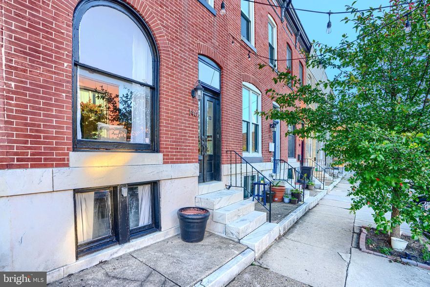 Welcome to 146 N Luzerne Ave, a home full of charm and character in the heart of Baltimore! Featuring exposed brick walls, gleaming wood floors, and timeless details throughout. The gourmet kitchen boasts stainless steel appliances, granite countertops, and direct access to a private patio - perfect for entertaining. Upstairs offers nicely sized bedrooms, including a rear bedroom with balcony access. Enjoy the unbeatable location just steps from Patterson Park and close to dining, shopping, and city attractions. A perfect blend of old-world charm and modern updates awaits!