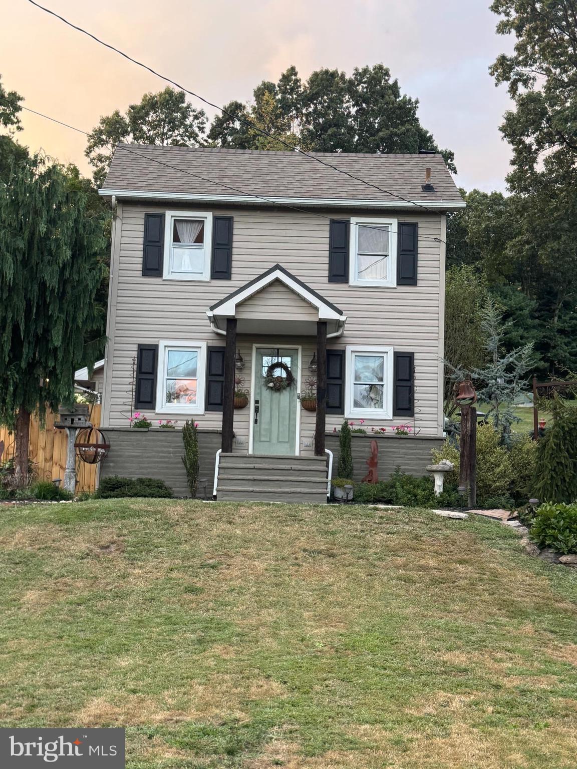 Come and see this beautifully restored old farmhouse. Too many improvements and upgrades to mention all. It's small but has outbuildings and outdoor living space. Retractable awning makes sitting outside on the patio very enjoyable.