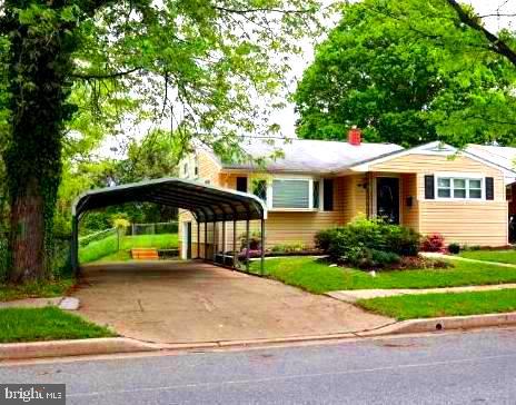 Remodeled 4BR/2.5BA split-level home located in the quiet neighborhood of Woodmoor Estates. This beautiful home is filled with natural light and features new luxury vinyl plank flooring and carpeting throughout. The main level offers a spacious living room with an accent wall and electric fireplace, a stunning newly remodeled kitchen, and a generous dining room. Upstairs, you'll find a large primary bedroom with an en-suite bathroom and a cozy electric fireplace, two additional sizable bedrooms, and a beautifully tiled full bath. The finished lower level includes a large bedroom/family room with an electric fireplace, sliding glass doors that open to a patio, a half bath, and a utility room. Covered carport and large backyard for outdoor entertaining. This move-in-ready home is waiting for its new owner.