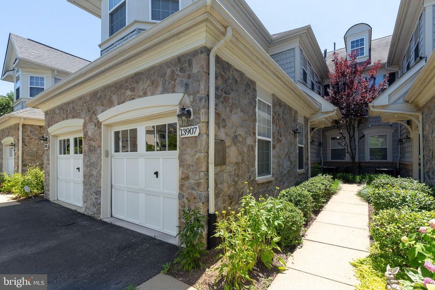 Move in Ready! Sought after Belmont Bay. Home Warranty Included. Come and relax in this large 4bedroom 2 full baths and 1 car garage Condo. Beautiful views from private balcony. High ceilings and open floor plan through out. Spacious Bright Large Kitchen with Stainless Steel Appliances. Features a Breakfast Bar and Nook. Large Master Suite with Vaulted Ceilings & Deluxe Master Bath. Cozy Living Room Fireplace with Slider to Private Balcony. Brand New Water Heater and New Carpets. Community Amenities include a Pool, Tennis Courts, Playgrounds, Marina, Bike Trails, Basketball Court. Easy Commute to DC, Pentagon, Fort Belvoir, and Quantico. Walk or ride to the marina on the Occoquan, beautiful waterfront community.  Just minutes away from VRE/bus station and Rt. 95.