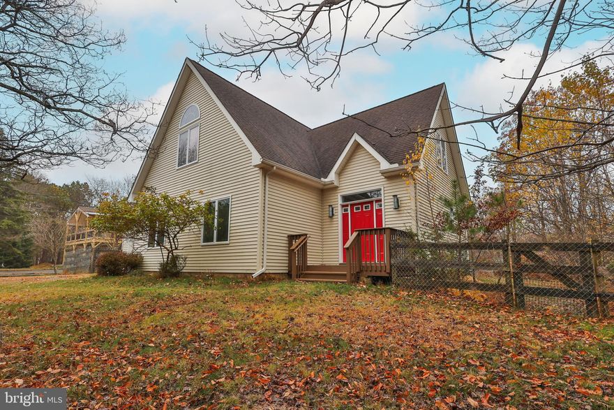 Absolutely stunning A-Frame within Towamensing Trails! This custom home provides quality construction & finishes throughout!  Beautiful setting with a fenced in yard! Mature landscaping that provides an abundance of delicious pears, berries, grapes & flowering plants! Inside you are welcomed by the oversized foyer with a large closet for coats or storage! High ceilings throughout this spacious home! Oversized kitchen offers ample cabinet storage & workspace! Granite counters, black appliances, eat at island with additional storage below! Sliding door provides access to the rear paver patio & serene yard! Spacious living area with two story ceilings, wall of windows for stunning views, propane stone fireplace, real bamboo hardwood floors & neutral decor! First floor laundry room with washer& dryer included! Two large first floor bedrooms with 9' ceilings and a modern full bath with tile and glass shower door! Upstairs boasts flex space with loft area! Master bedroom with vaulted ceiling and ample closet space! Fourth bedroom with custom wall colors, vaulted ceilings & more storage space!  Second floor full bath offers a large soaking tub/shower and modern vanity! Oversized one car garage & access to the crawl space! Close to hiking, biking, ski resorts, Jim Thorpe, Lake Harmony, eateries & more! Home has been professionally cleaned & well maintained! Upgraded foil covered insulation! Original owners since 2008, this home has never been rented, smoked in and always pet free!